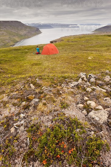 Young woman with a tent