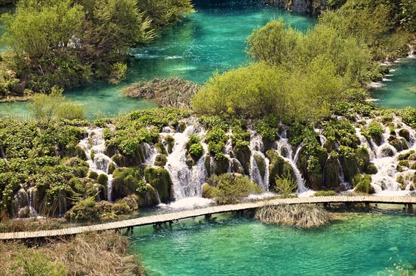 Cascades of water running over the travertine deposits between the lakes of Plitvice