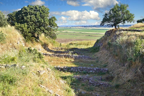 Part of the Schliemann Trench excavated from 1871 with remains of the original walls and Bronze age house walls of Troy from the Early Troia I Period