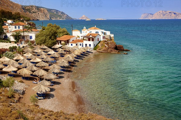 Vlychos village and beach with umbrellas