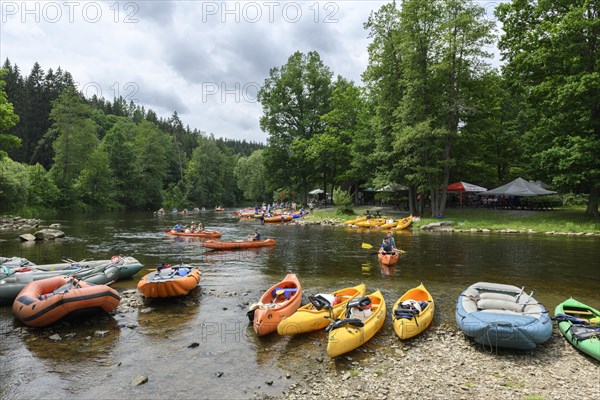 Kayaks and inflatable boats on the Vltava near Cesky Krumlov