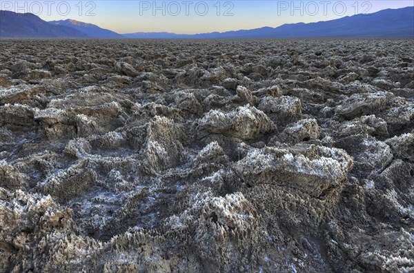 Salt crusts at the Devil's Golf Course at sunset