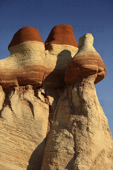 Eroded hoodoos and rock formations discolored by minerals