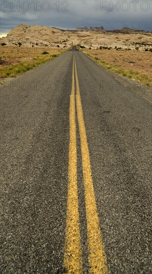 U.S. Highway 24 in the direction of the Temple Mountain Group ahead of Goblin Valley State Park