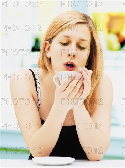 Woman drinking coffee