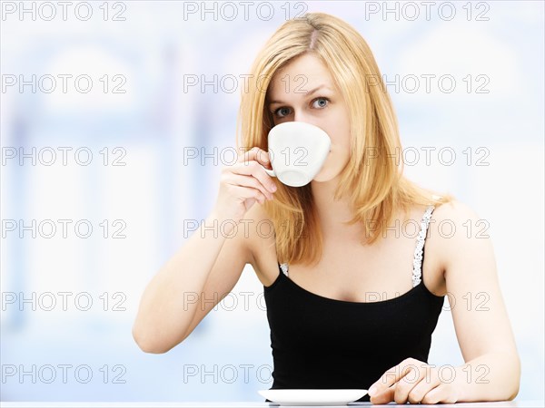 Woman drinking coffee