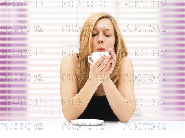 Woman drinking coffee