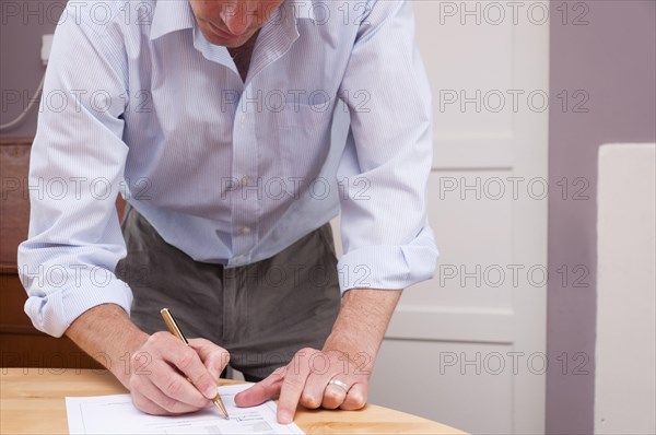 Man signing contract