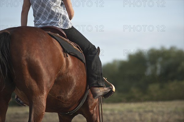 Woman on a Quarter Horse