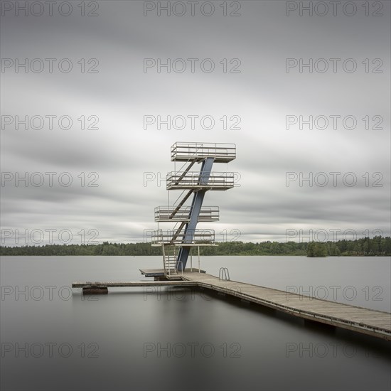 Wooden jetty with diving platform at lake Gosjon