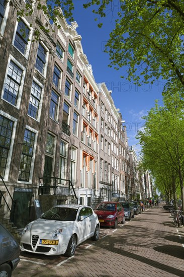 Historic buildings beside Keizersgracht canal in Amsterdam
