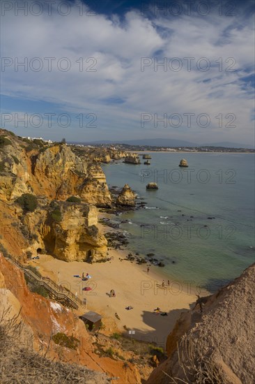 Praia do Camilo beach with Praia Dona Ana beach at back