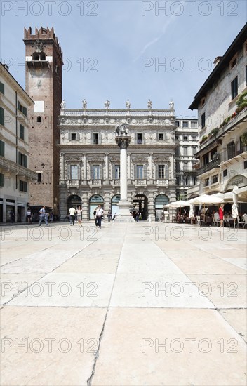 Palazzo Maffei and Torre del Gardello behind a Venetian column with the lion of St. Mark