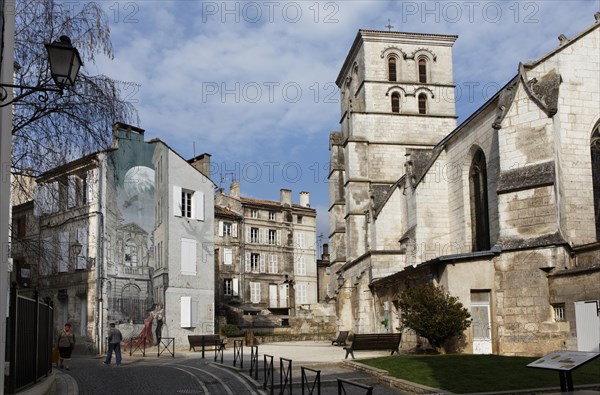 Saint Andre Church and mural Memoires du XXeme Siecle by Yslaire