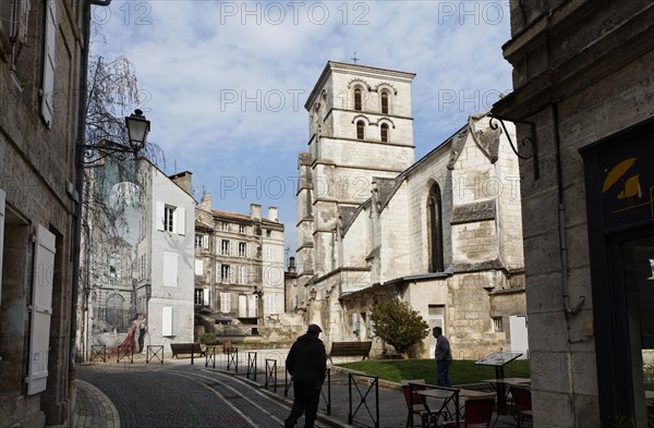 Saint Andre Church and a mural Memoires du XXeme Siecle by Yslaire