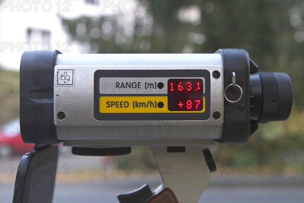 Radar gun showing speed and distance data