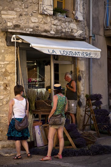 Tourists looking at display of lavender shop