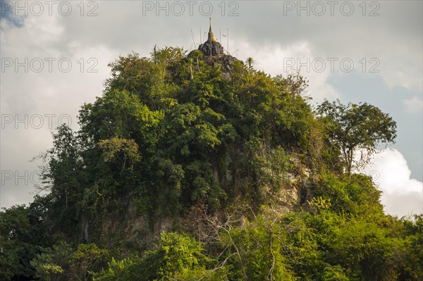 Golden chedi on a hill