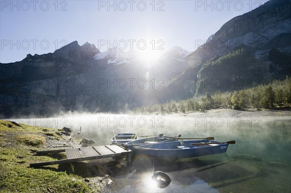 Boats and morning fog