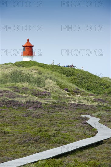 Dunes with cross light and boardwalk