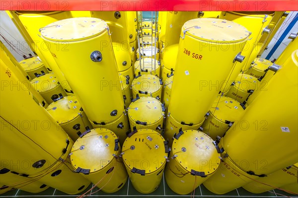 Radioactive waste is stored in barrels and Castor containers prior to permanent waste storage