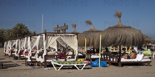 Sunbeds on the Copacabana Playa beach