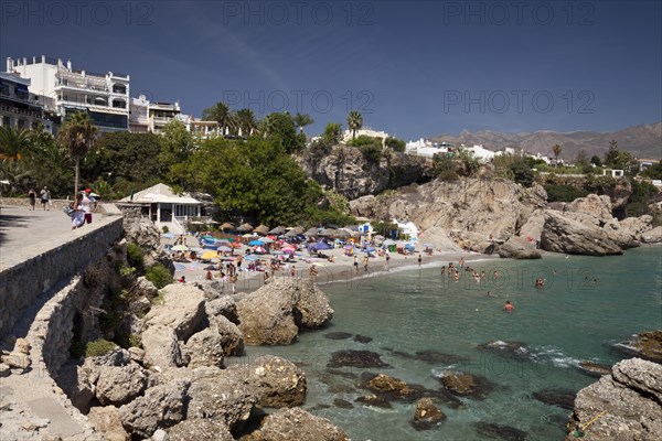 View from the observation deck of Balcon de Europa towards the beach and coast in Nerja