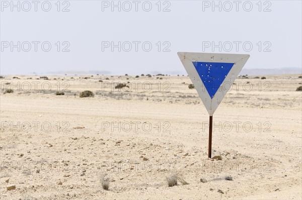 Weathered road sign