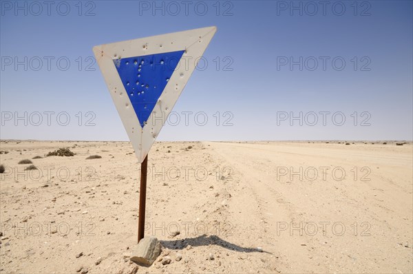 Weathered road sign