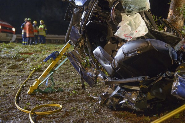 The wreckage of a Peugeot after fatally crashing into a tree