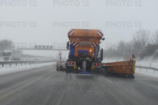 Snow-clearing vehicle from the motorway maintenance authorities in operation on the A8 motorway