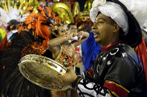 Musician of the drum group Bateria with pandeiro