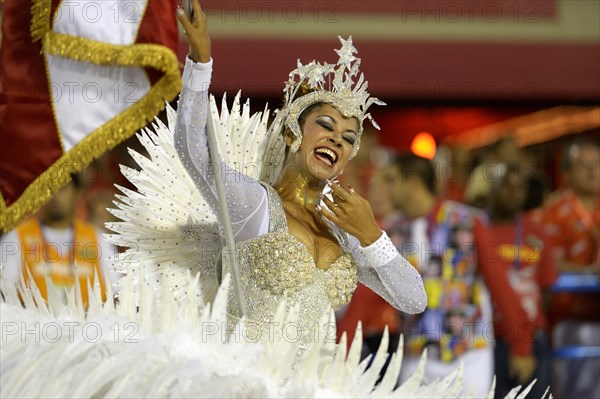 Flag bearer Porta Bandeira at the parade of the samba school Inocentes de Belford Rocho