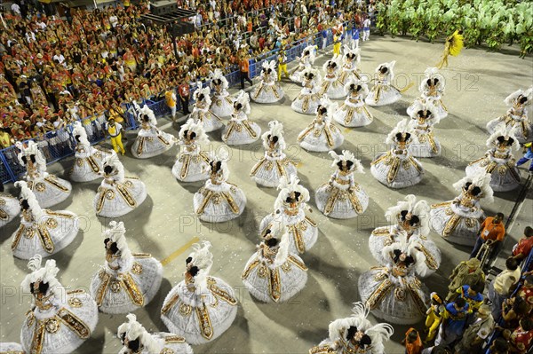 Female dancers wearing wide skirts