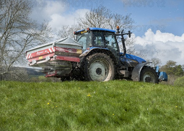 Tractor with spreader