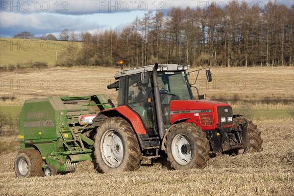 Massey Fergusson tractor with McHale round baler