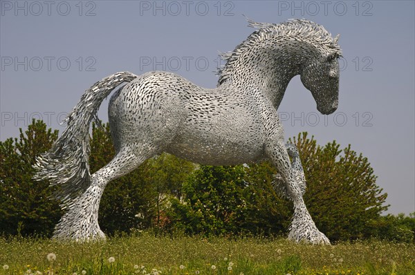 Metal sculpture of Gypsy Cob horse installed on roundabout