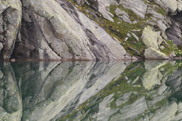 Rocks being reflected in the water