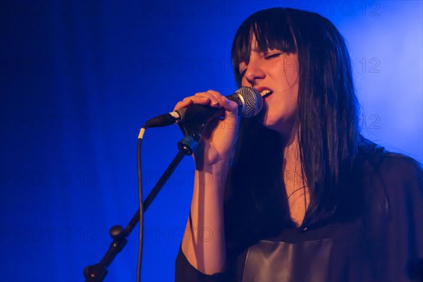 Franca Mock from the Swiss women's rock band Velvet Two Stripes performing live in the Schueuer concert hall