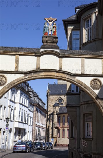 Archway with a crucifixion group near Liebfrauenbasilika church