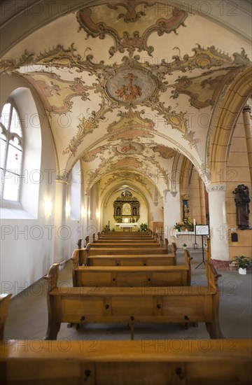 The late Gothic side aisle of the Church of St. Gangolf on Hauptmarkt square