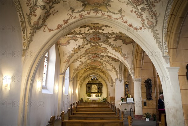 The late Gothic side aisle of the Church of St. Gangolf on Hauptmarkt square