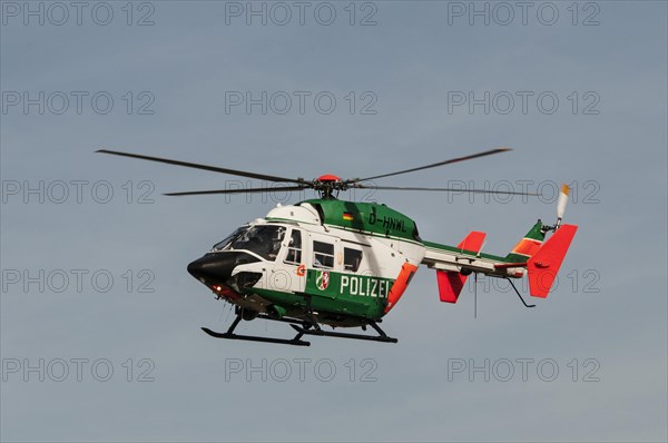 Police helicopter "Hummel 9" in flight near Duesseldorf Airport