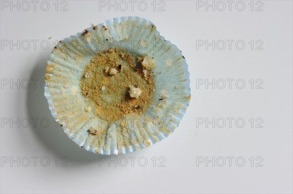 Paper and crumbs of a muffin