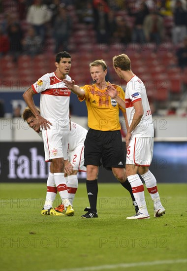 Referee Serge Gumienny pointing to the penalty spot