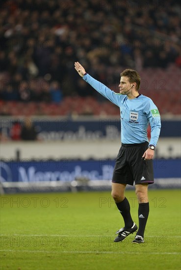 Referee Dr. Felix Brych awarding a free kick