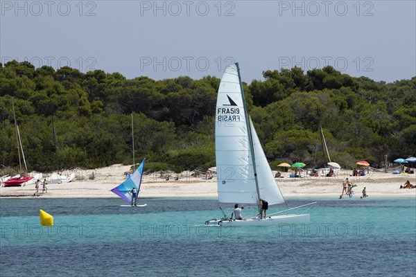 Sailboat off the beach of Platja Es Trenc