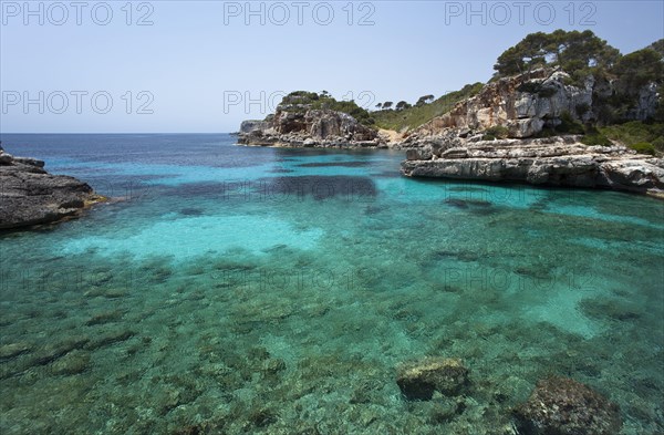 Rock-lined bay of Calo des Moro