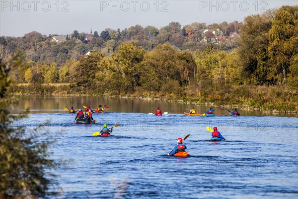 Canoeists on the Ruhr River in autumn