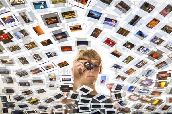 Young woman sorting mounted slides